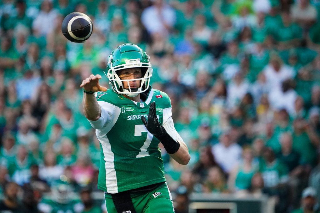 Saskatchewan Roughriders quarterback Trevor Harris (7) throws against the Edmonton Elks during the first half of CFL football action in Regina, on Friday, July 25, 2025. THE CANADIAN PRESS/Heywood Yu.