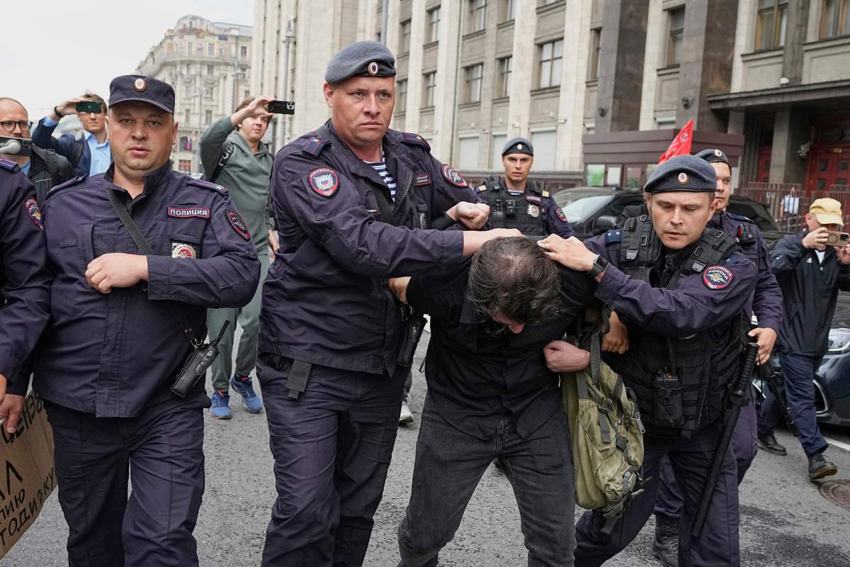 Police detain an activist during a protest in front of the State Duma, the lower house of the Russian parliament, in Moscow, Russia, Tuesday, July 22, 2025, prior to lawmakers approving a measure that punishes online searches for information that is deemed “extremist.” .
